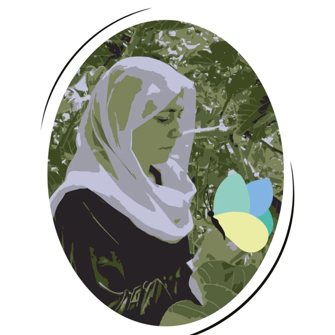 a woman holding a butterfly